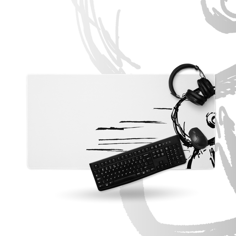 Sketch Series 001 XL desk mat on a desk with a keyboard, mouse and headphones for scale